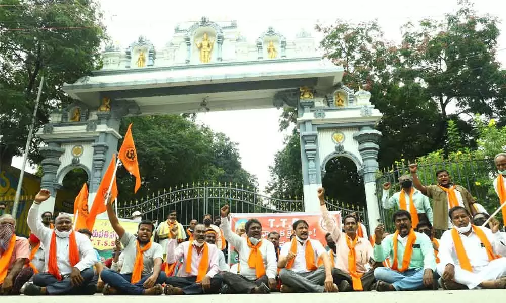 Tirumala Tirupati Samrakshana Samithi members staging a dharna in front of at TTD administrative building in Tirupati on Monday