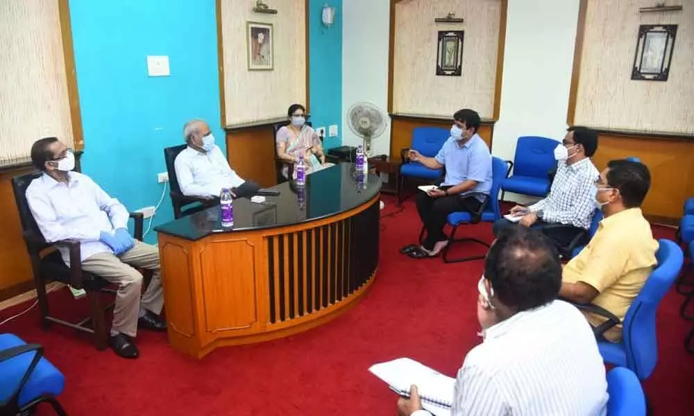 Special Investigation Team chairman K Vijay Kumar conducting a review meeting with the district officials in Visakhapatnam on Monday