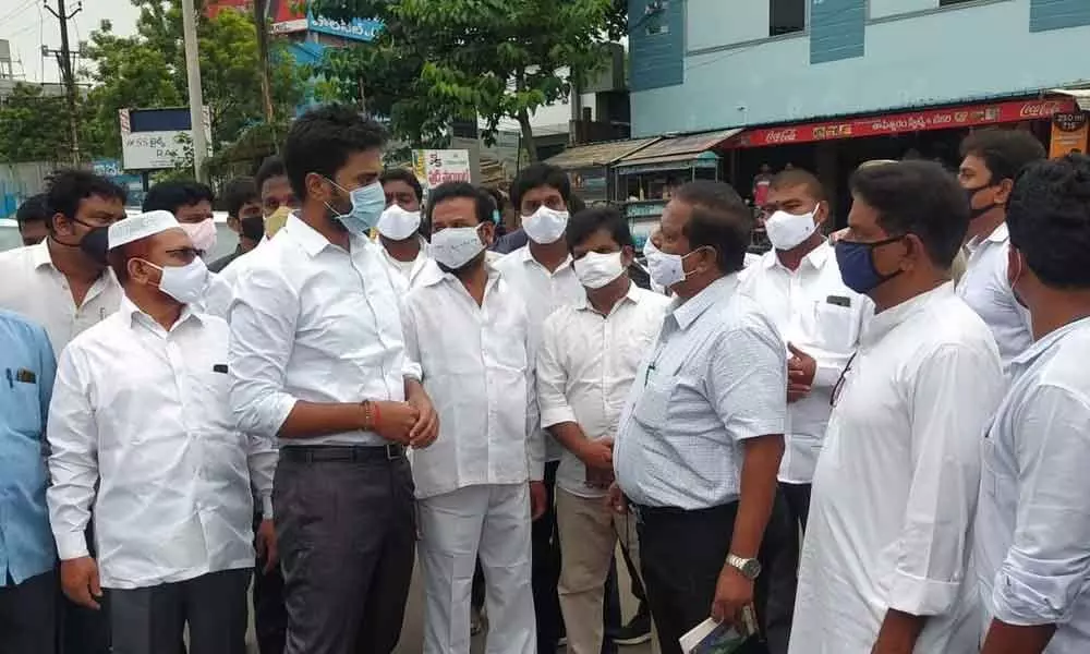 MP Margani Bharat along with Roads and Buildings Chief Engineer Ramesh Kumar inspecting Gammon bridge in Rajamahendravaram on Monday