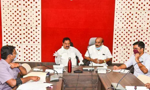 Deputy Chief Minister K Narayanaswamy taking part in a review meeting held at the Collectoate in Chittoor on Monday. MP N Reddappa and District Collector Dr N Bharat Gupta are also seen.