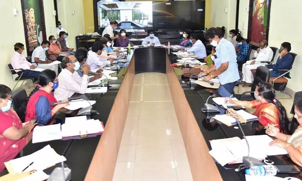 District Collector I Samuel Anand Kumar addressing a review meeting in Guntur