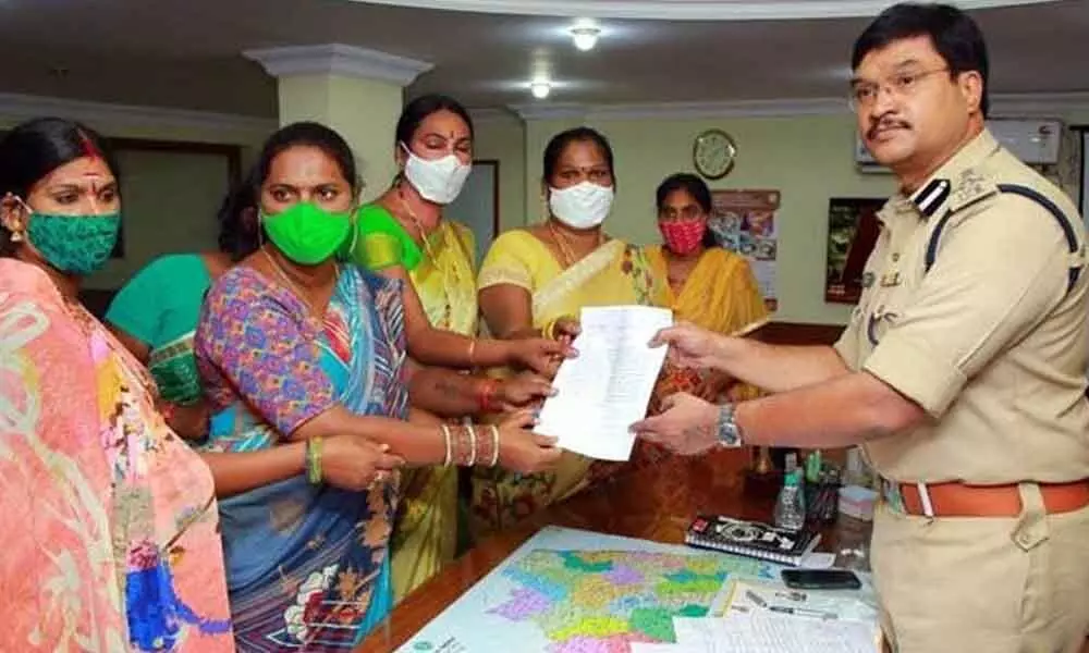 Hijras, led by their association State president Laila submitting a memorandum to SP AV Ranganath at his chamber in Nalgonda on Tuesday