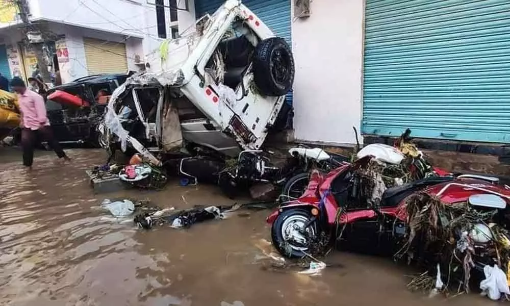 Vehicles suffer extensive damage due to floods