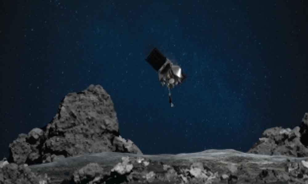 NASA spacecraft makes 1st touchdown on asteroid Bennu