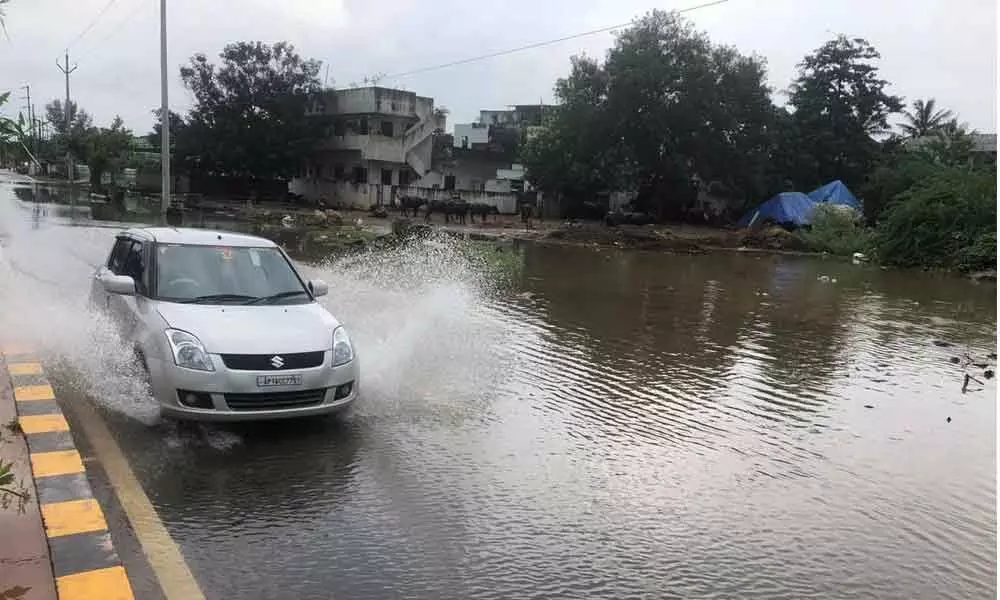 One of the waterlogged roads in Kakinada
