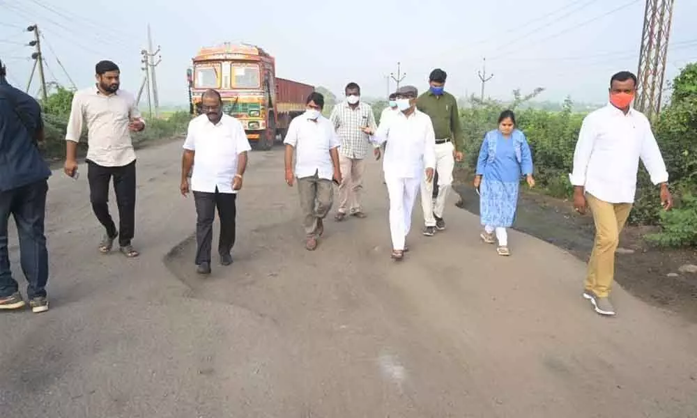 MP Nama Nageswara Rao inspecting damaged national highway at Aswaraopet on Thursday