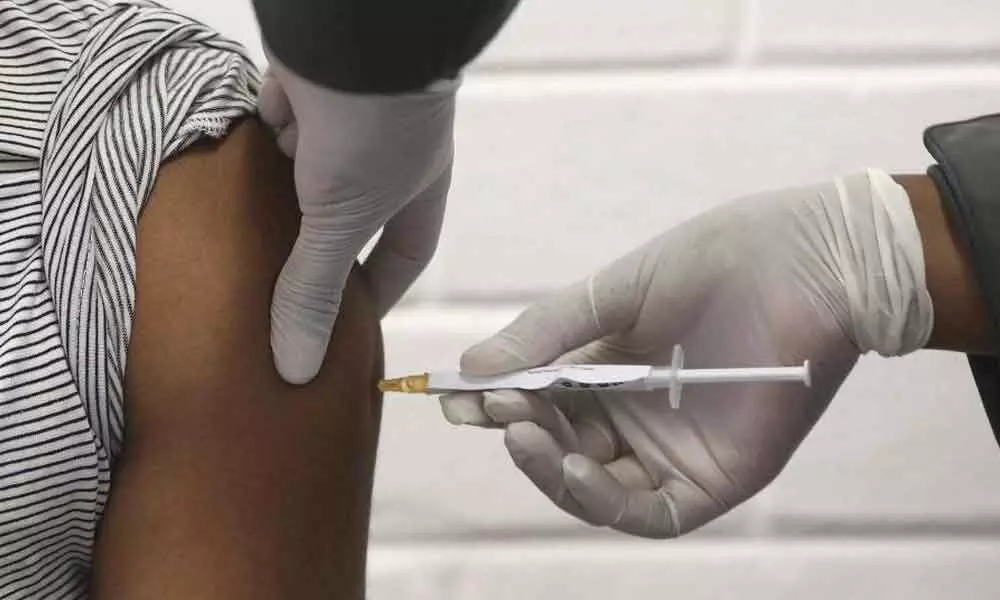 Vaccine trial will continue, says Oxford