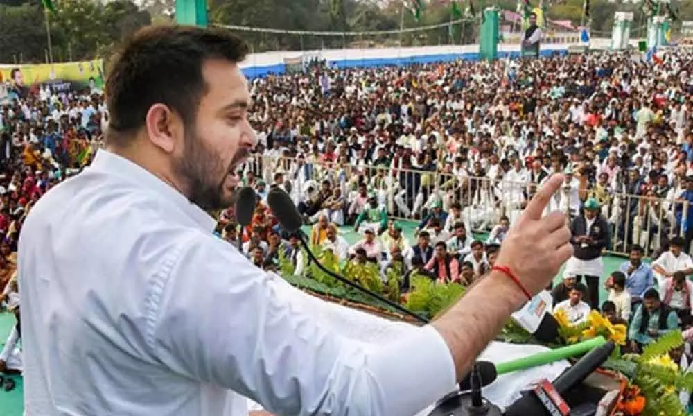 Tejashwi steps into Lalus shoes to spearhead RJD poll campaign