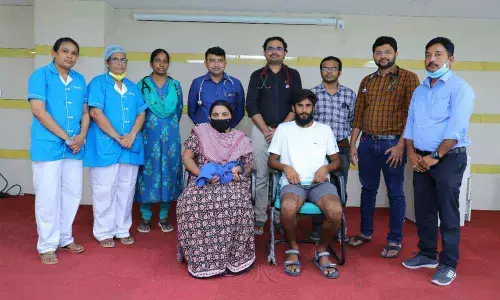 KIMS doctors along with the mother of premature baby, in Kurnool