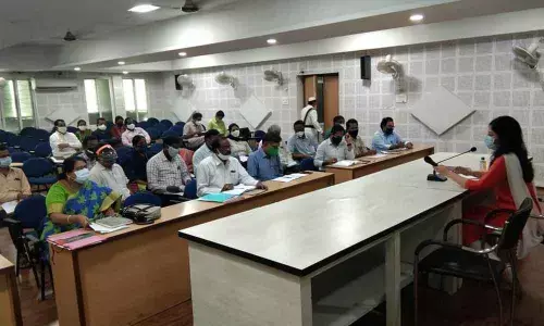 Sub-Collector Anupama Anjali reviewing the progress in construction works with the officials in Rajamahendravaram on Friday
