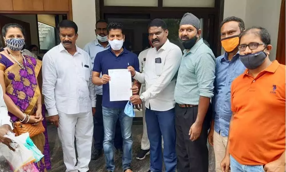 Representatives of Telangana Hotels and Resorts Sales Professionals Association submitting a representation to Malkajgiri MP A Reventh Reddy in Hyderabad on Saturday