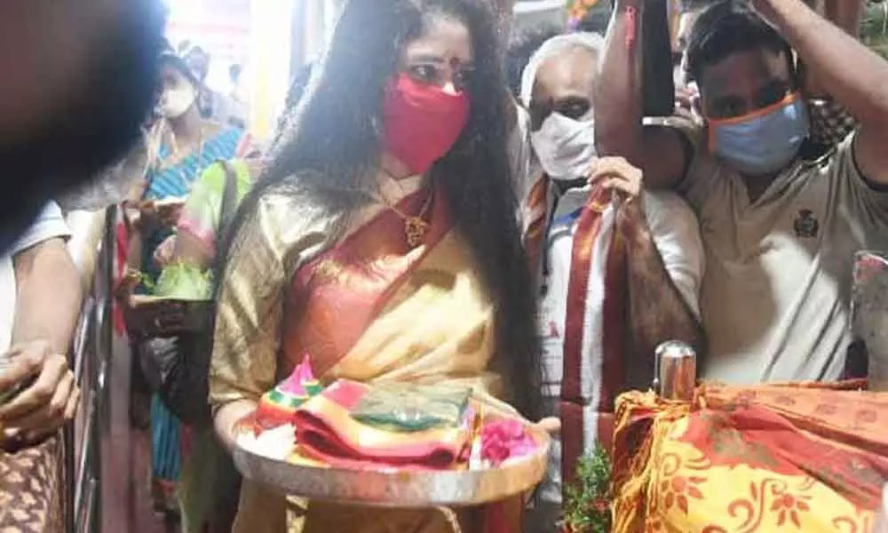 Sanchaita Gajapathi Raju presents silk garments to Sri Pydithalli in Vizianagaram