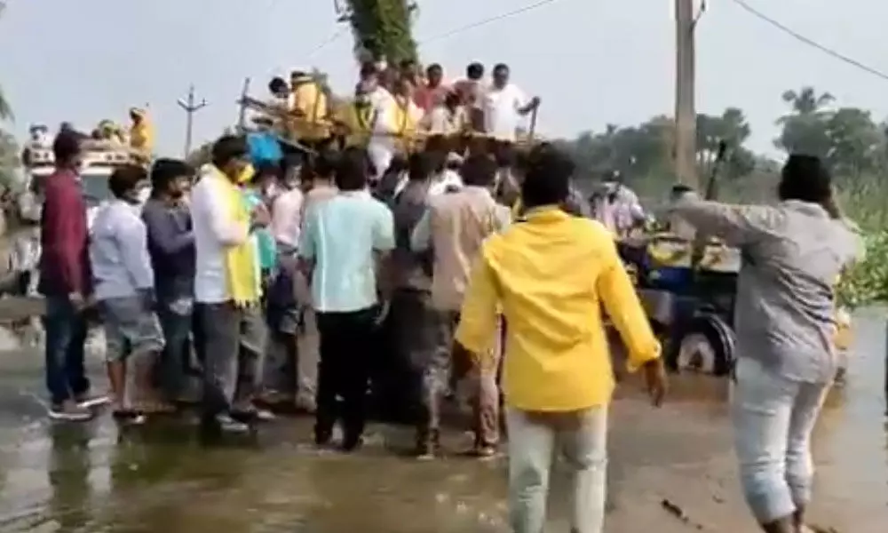 Nara Lokesh narrowly escapes danger after tractor he drove rams into canal in West Godavari