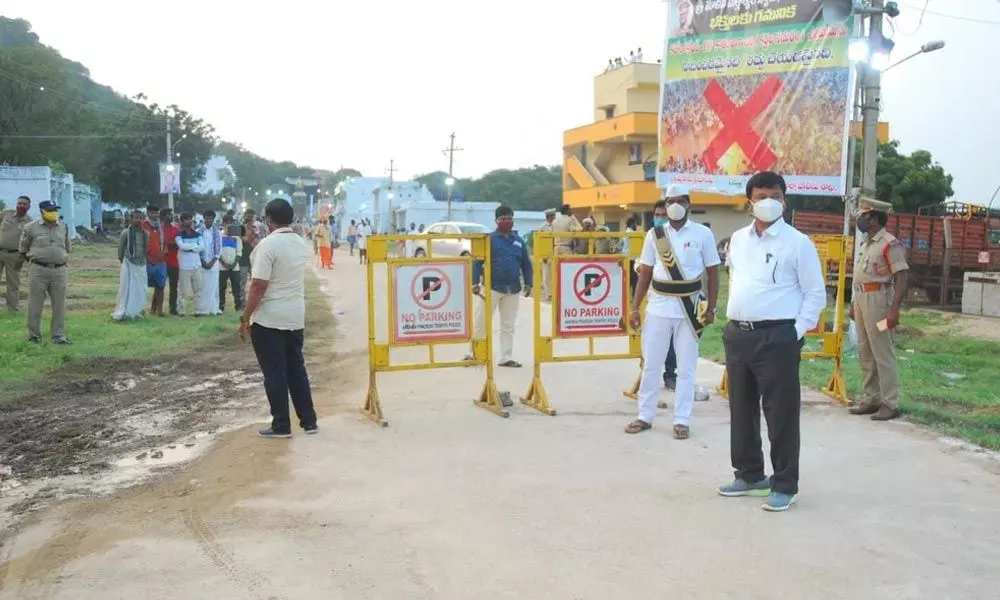 A poster displayed cancelling the Banni festival in view of corona pandimic in Devaragattu village