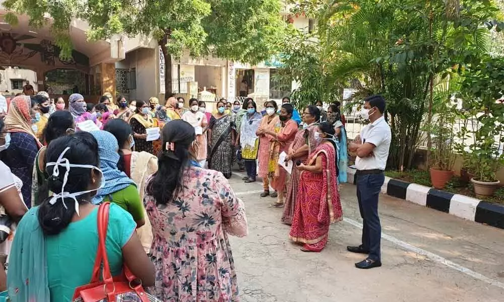NIMS nurses staging a protest on the hospital premises in Hyderabad on Tuesday