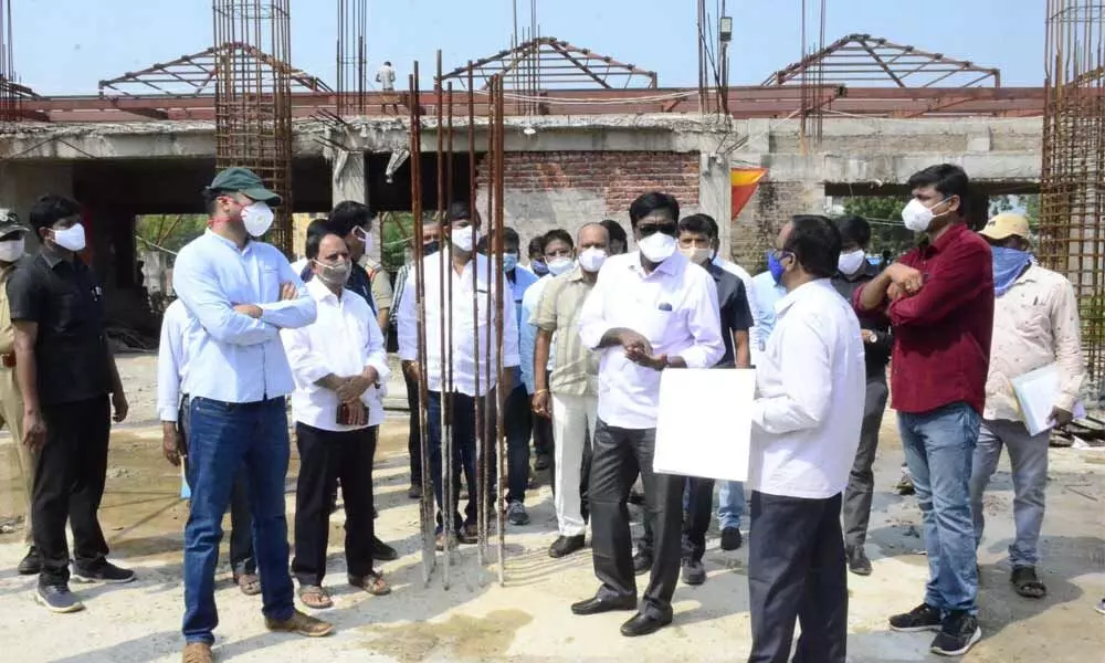Transport Minister Puvvada Ajay Kumar inspecting the construction of new model bus stand in Khammam on Tuesday