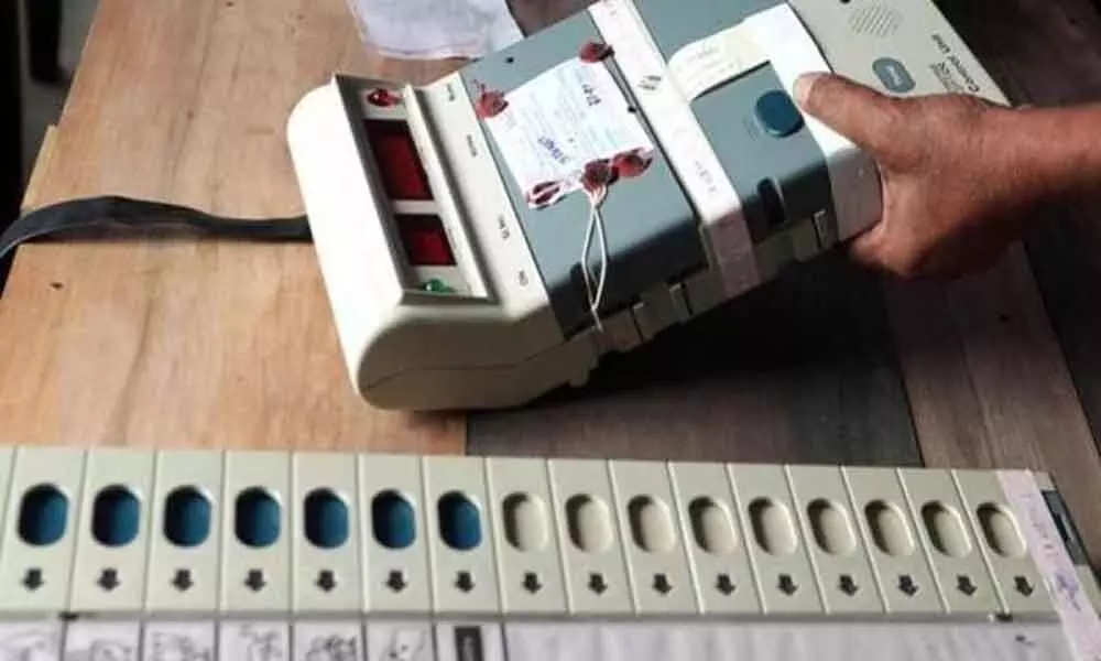 Over 18% voting as glitches in 75 EVMs hassle Bihar voters