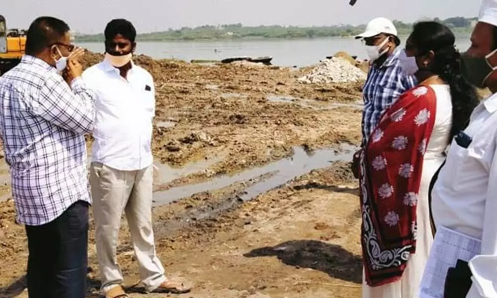 Officials inspecting the pushkar ghat works at Rambotla in Kurnool on Wednesday
