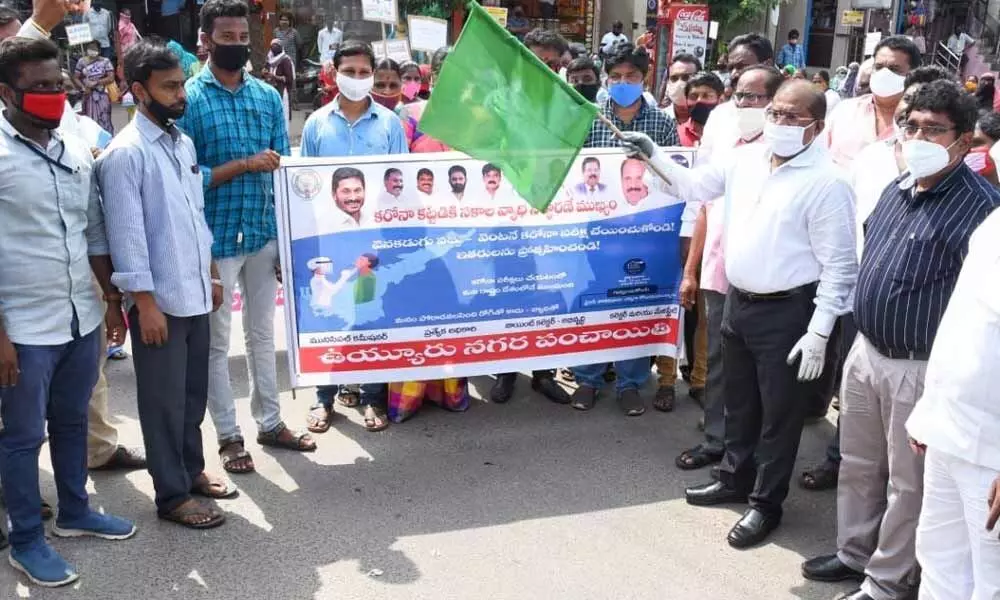 Krishna district Collector Md Imtiaz flagging off coronavirus awareness rally in Vuyyur on Wednesday