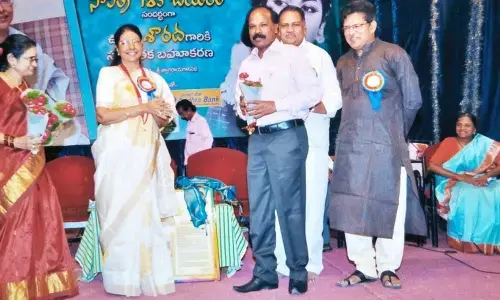 Vijay Kumar receiving appreciation from noted film actress Sarada