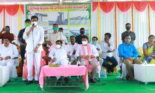R&B Minister Vemula Prashanth Reddy addressing a meeting after inaugurating high-level bridge at Mattapally village on Wednesday.