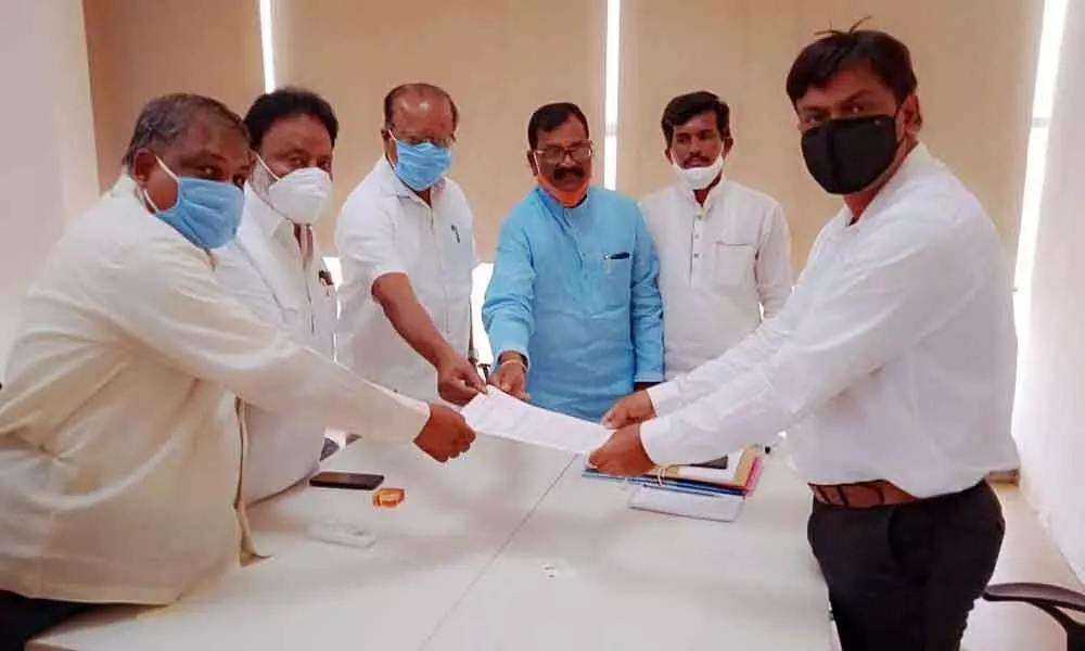 Telangana State BJP leaders submitting a memorandum to newly appointed observer for law and order for the Dubbaka bypoll Saroj Kumar Thakur on Thursday