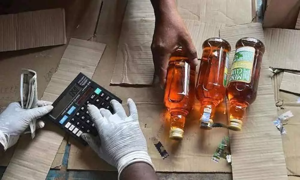 Prices of premium liquor slashed to curb smuggling