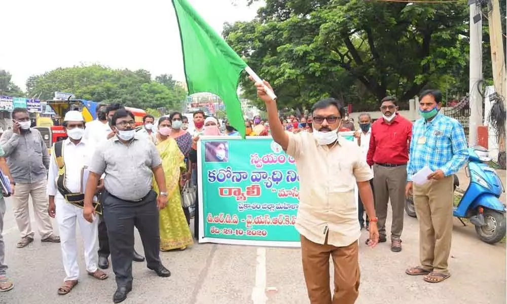 Prakasam district Collector Dr Pola Bhaskara flagging off Swayam Raksha rally in Ongole on Thursday
