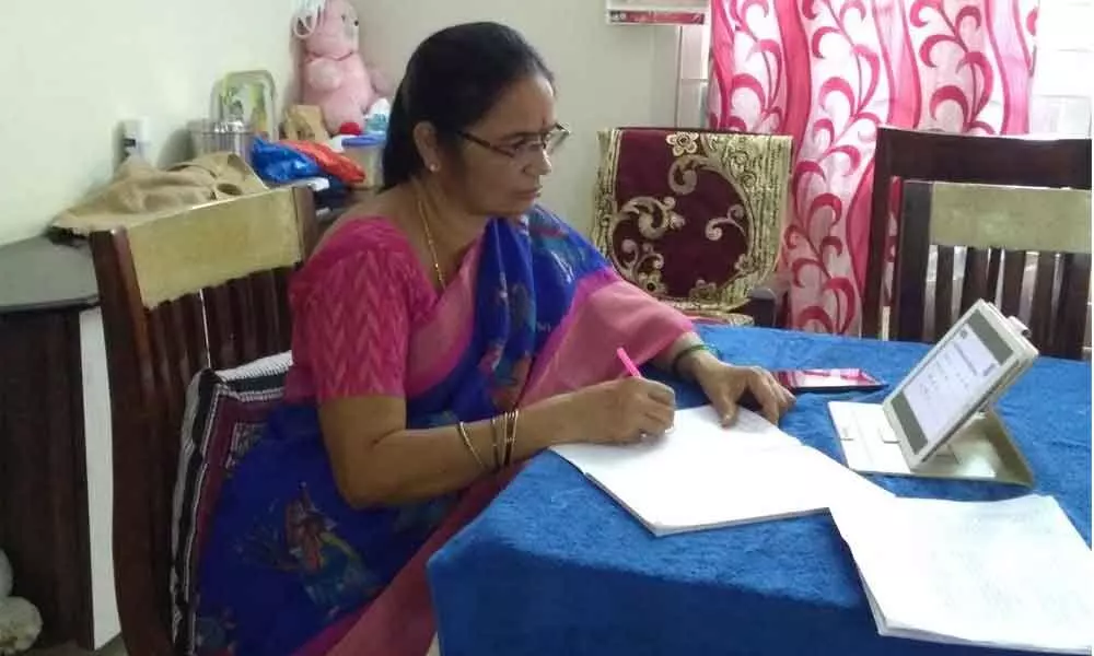 A teacher from Government Residential School for Visually-Challenged Girls imparting lessons online to the visually-impaired students in Visakhapatnam