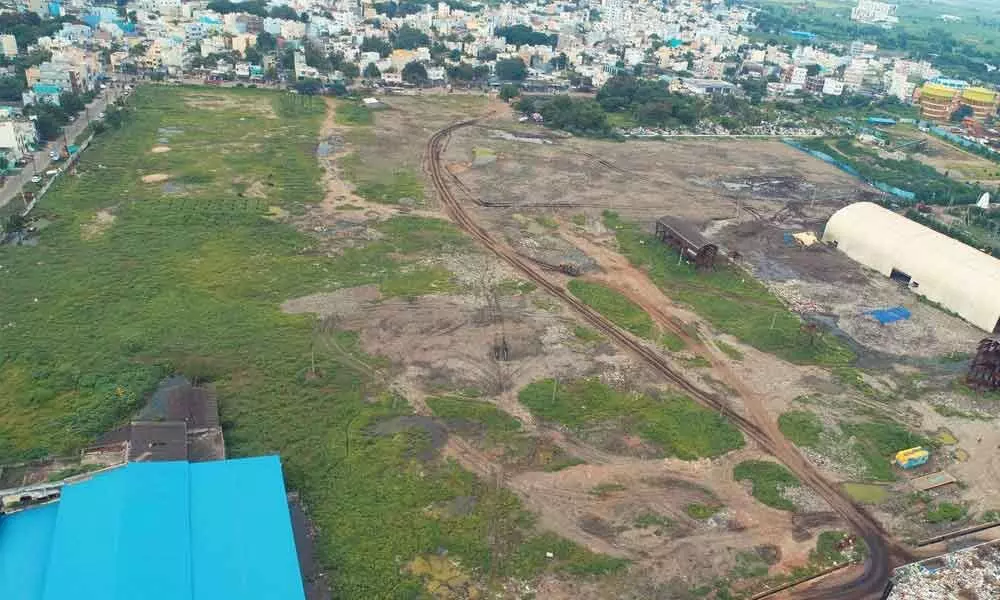 A view of the dumping yard site after disposing of waste from the area at Ajit Singh Nagar in Vijayawada