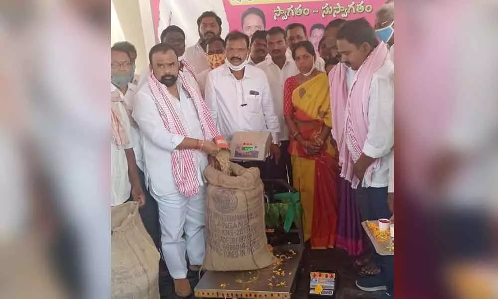 TS Cooperative Bank Vice-Chairman and DCCB Chairman of the erstwhile Nalgonda district Gongidi Mahender Reddy inaugurating IKP paddy procurement center at Gouraipally village on Friday