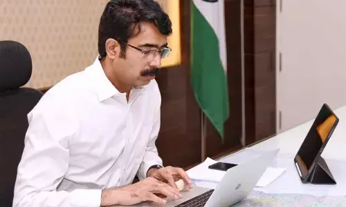 Collector D Muralidhar Reddy holding a virtual meeting with officials from Collectorate in Kakinada on Friday