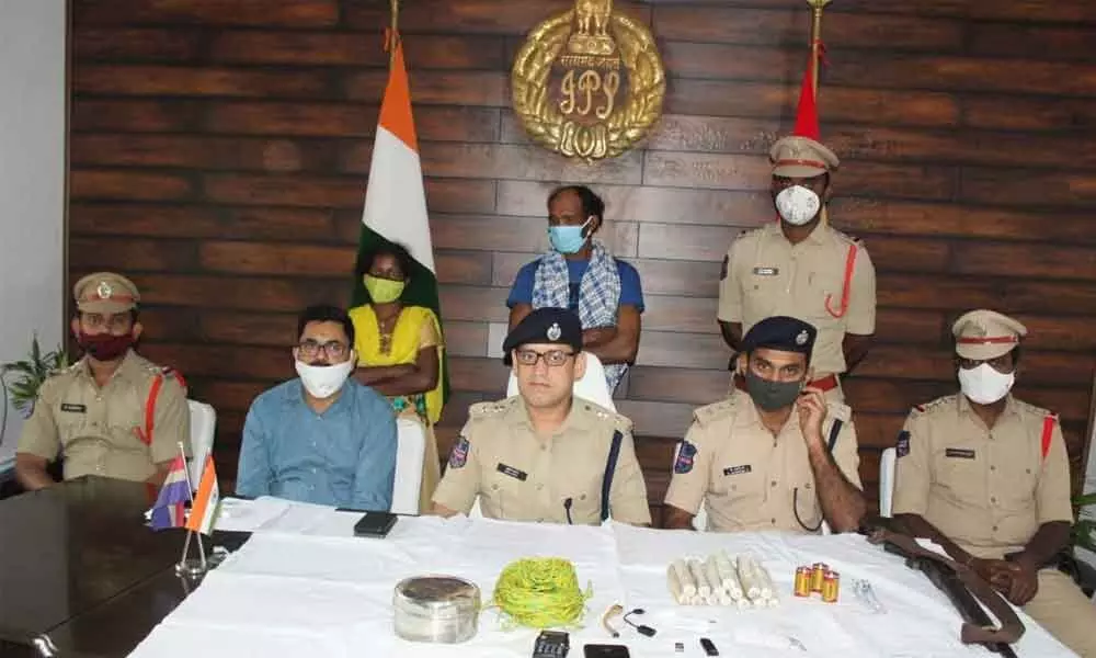 Bhadradri-Kothagudem SP Sunil Dutt with the arrested Maoists in his office at Kothagudem on Saturday