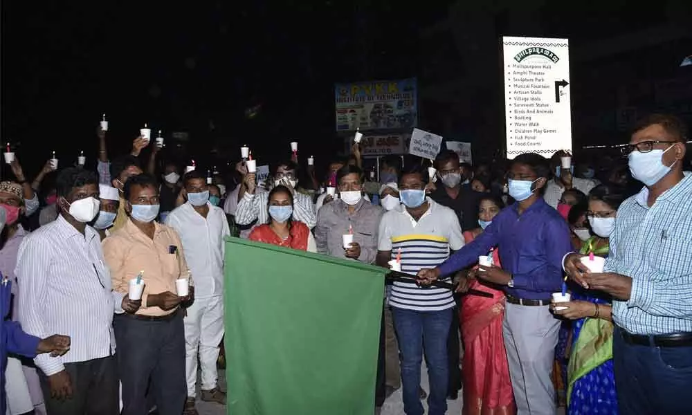 District Collector Gandham Chandrudu flagging off candlelight rally as part of corona awareness programme in Anantapur on Saturday