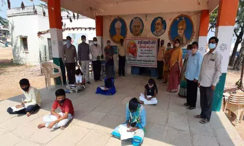 Students participating in essay writing and elocution competition at ZPHS Marikal on Saturday