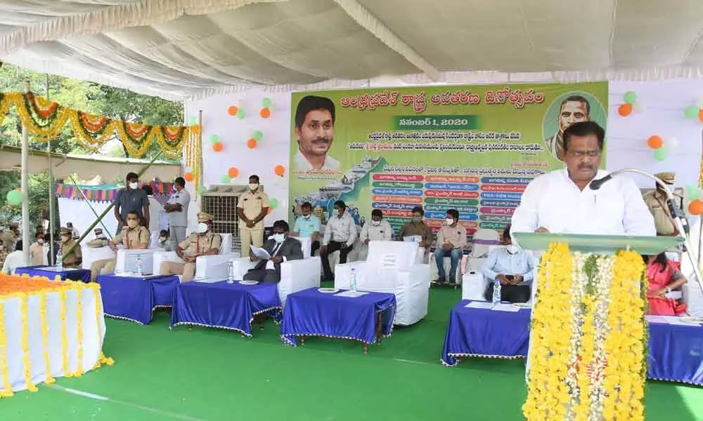 District In-charge Minister Ch Sri Ranganadha Raju speaking at a meeting in Guntur on Sunday