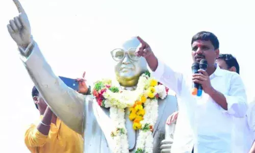 Teenmar Mallanna aka Chintapandu Naveen addressing a gathering after garlanding the statue of BR Ambedkar in Jangaon on Sunday