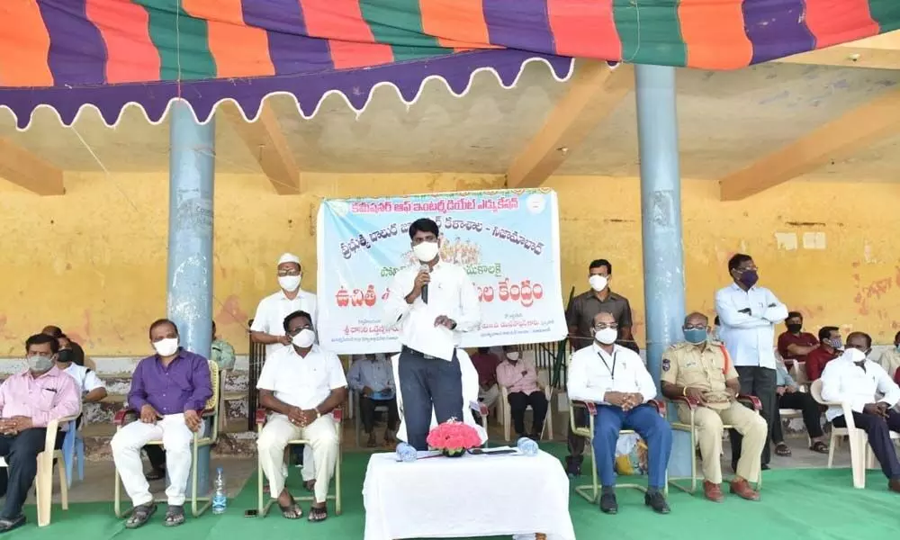 District Collector C Narayana Reddy addressing students at a police training programme at Nagaram Stadium in Nizamabad on Monday