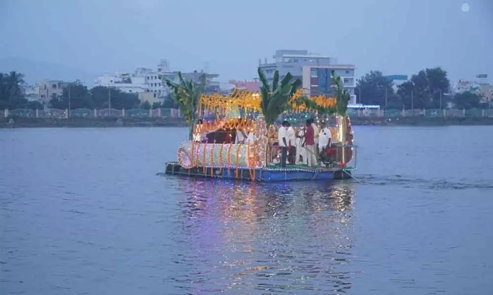 Goddess Pydithalli being taken out in a procession at Pedda Cheruvu in Vizianagaram on Tuesday