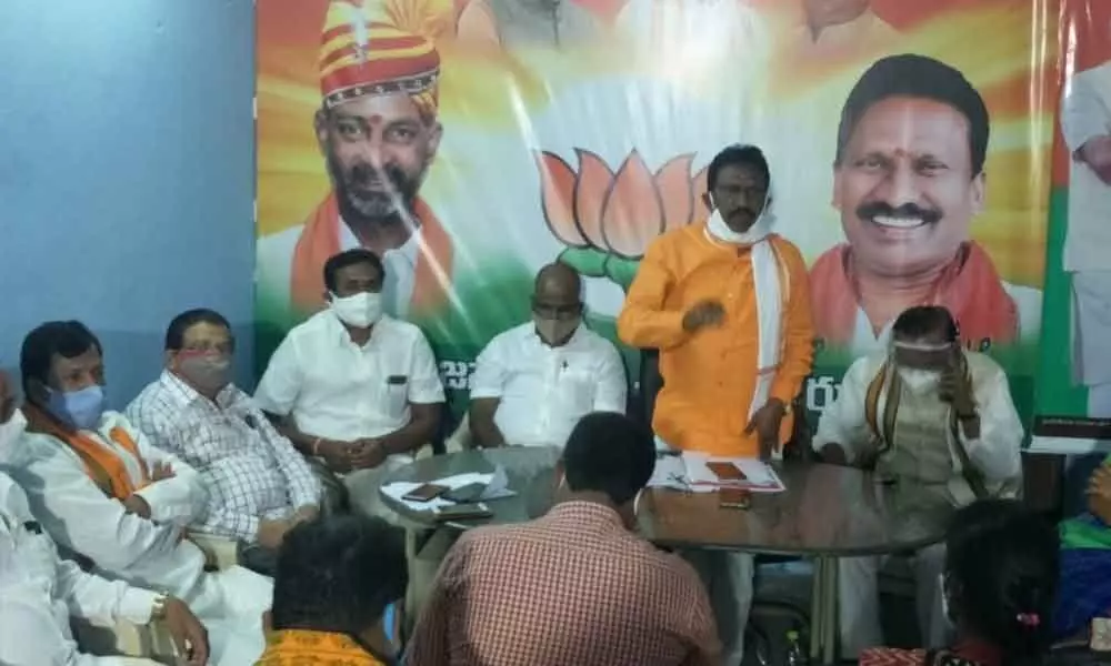 BJP leader speaking at a review meeting in Warangal on Tuesday