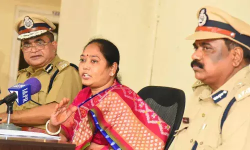 Home Minister M Sucharitha addressing the media in Vijayawada on Friday. Director Generals, Prisons, Mohmmad Hassan Reza (left) is also seen.