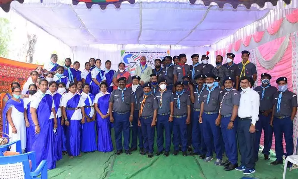 Chief Commissioner of District Scouts and Guides M Venkata Subbaiah posing for photo graph along with cadets in Kurnool on Saturdat