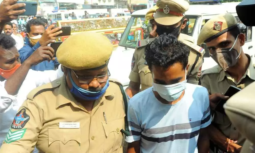 Police producing the accused B Nagendra Babu in civil court in Vijayawada on Saturday