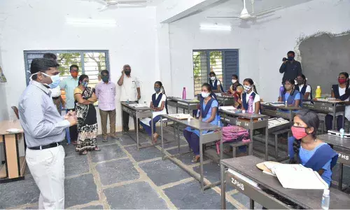 Collector Gandham Chandrudu inspecting government school in Siddirampuram village on Saturday