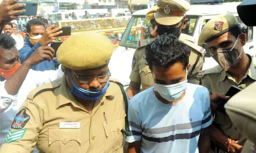 Police producing the accused B Nagendra Babu in civil court in Vijayawada on Saturday