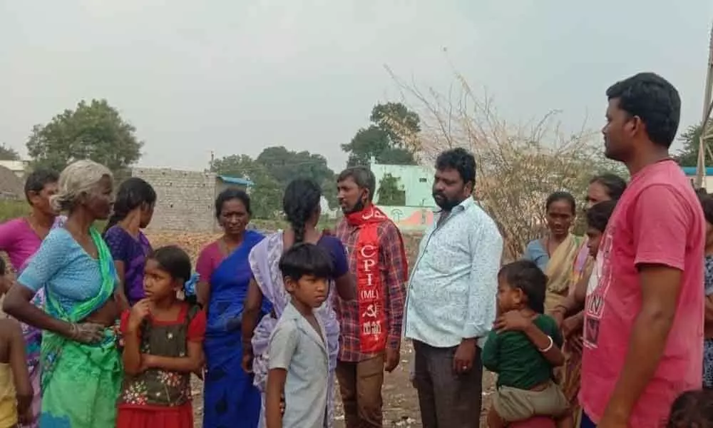 The villagers of Gajulapalli under CPI (ML) red star party staging a protest opposing setting up of wine shop on Sunday