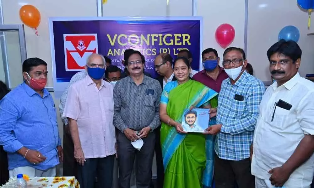 Home Minister Mekathoti Sucharita releasing a book on development with three capitals in Guntur on Sunday