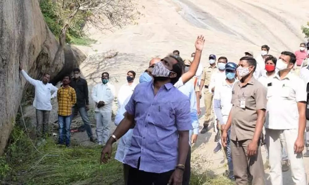 Tourism and Excise Minister Srinivas Goud inspecting the structure of monolithic Bhongir fort hillock in Bhongir on Monday