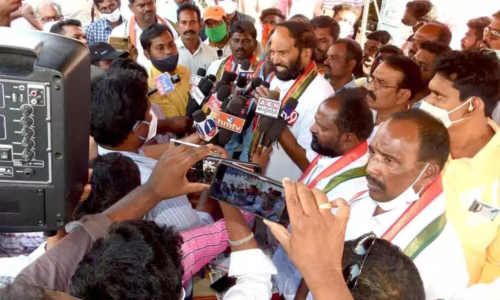 TPCC chief and Nalgonda MP Uttam Kumar Reddy addressing the media during a party signature protest at Kodad on Monday