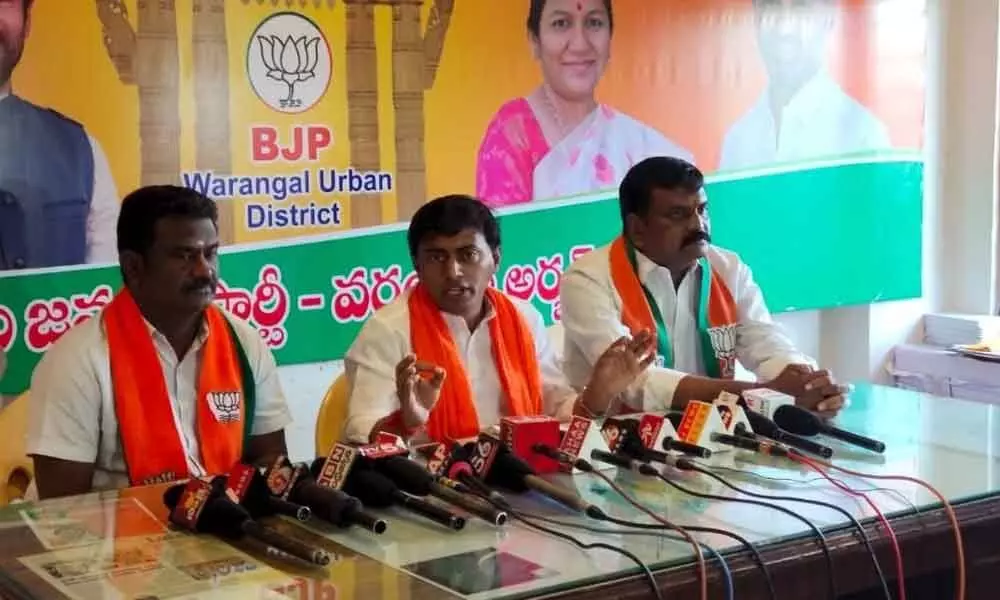 BJP State spokesperson Rakesh Reddy speaking at a press meet in Warangal on Monday